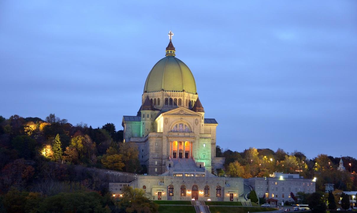 The exterior of Saint Joseph's Oratory of Mount Royal at night.